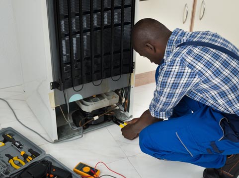 repairing a fridge freezer